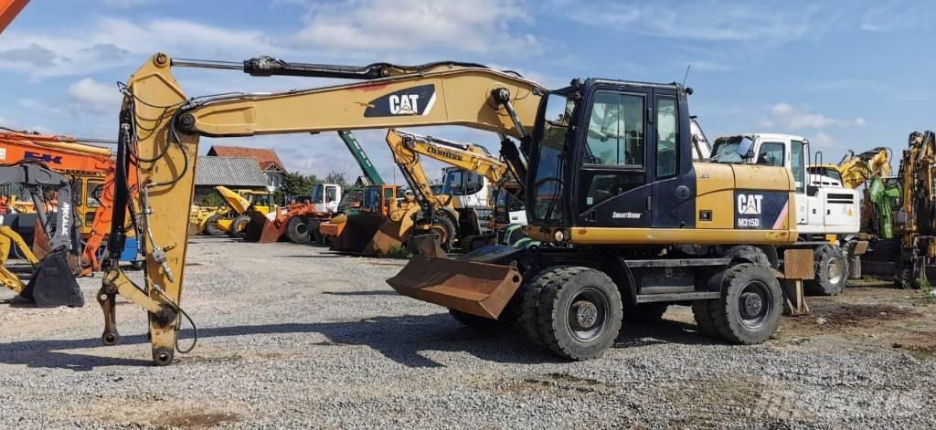 CAT M 315 D Bagri na kolesih