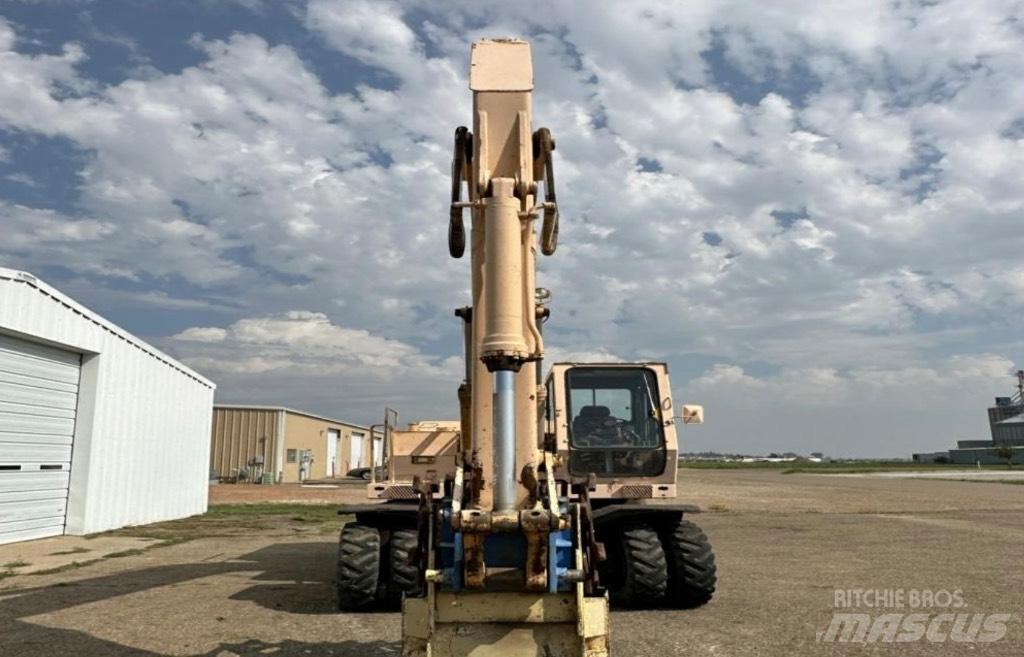 John Deere 595 Bagri na kolesih