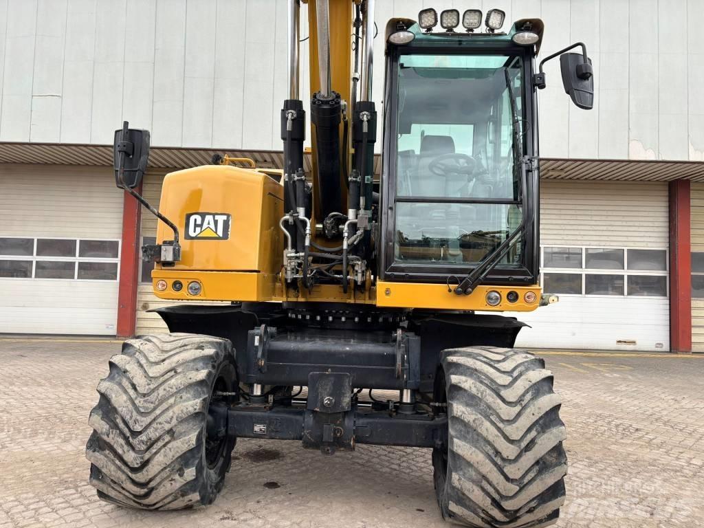 CAT M 318 F Bagri na kolesih