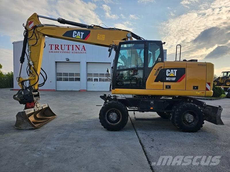 CAT M 318 F Bagri na kolesih
