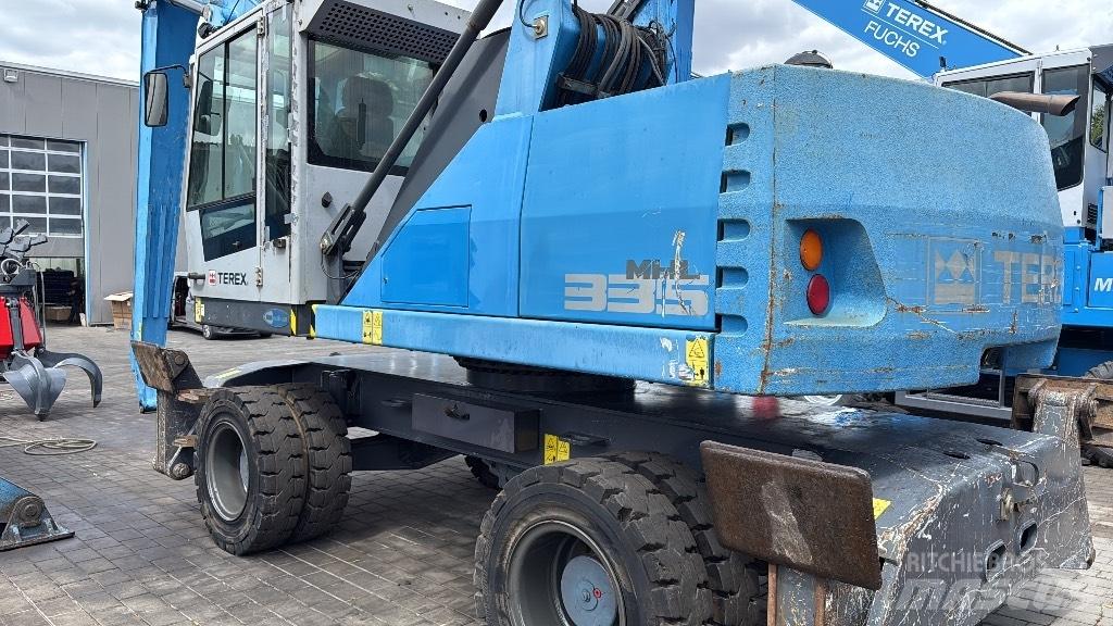 Fuchs MHL 335 E Bagri za prekladanje primarnih/sekundarnih surovin