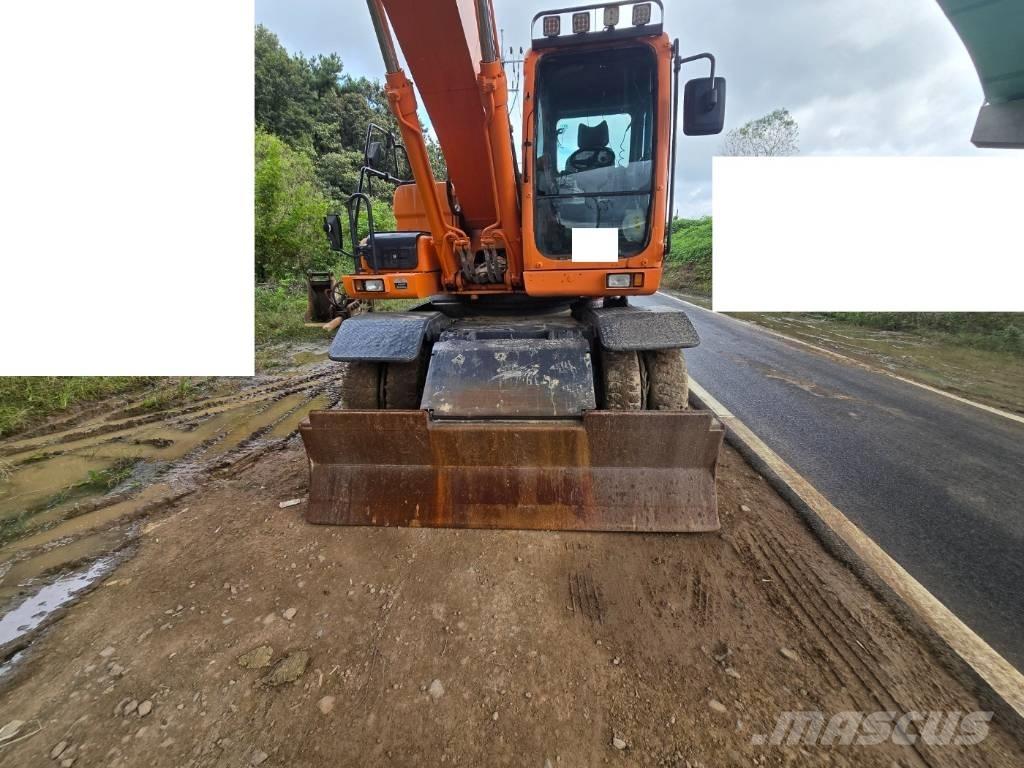 Doosan DX 210 W Bagri na kolesih