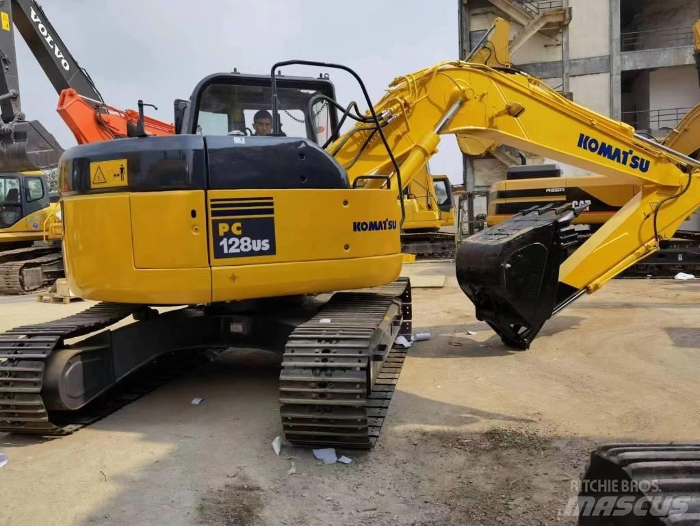 Komatsu PC 128 US Midi bagri 7t – 12t