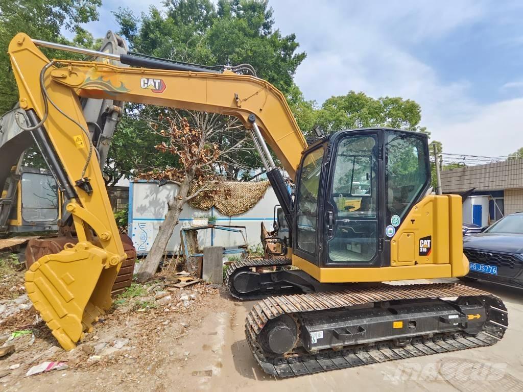 CAT 310 Bagri goseničarji