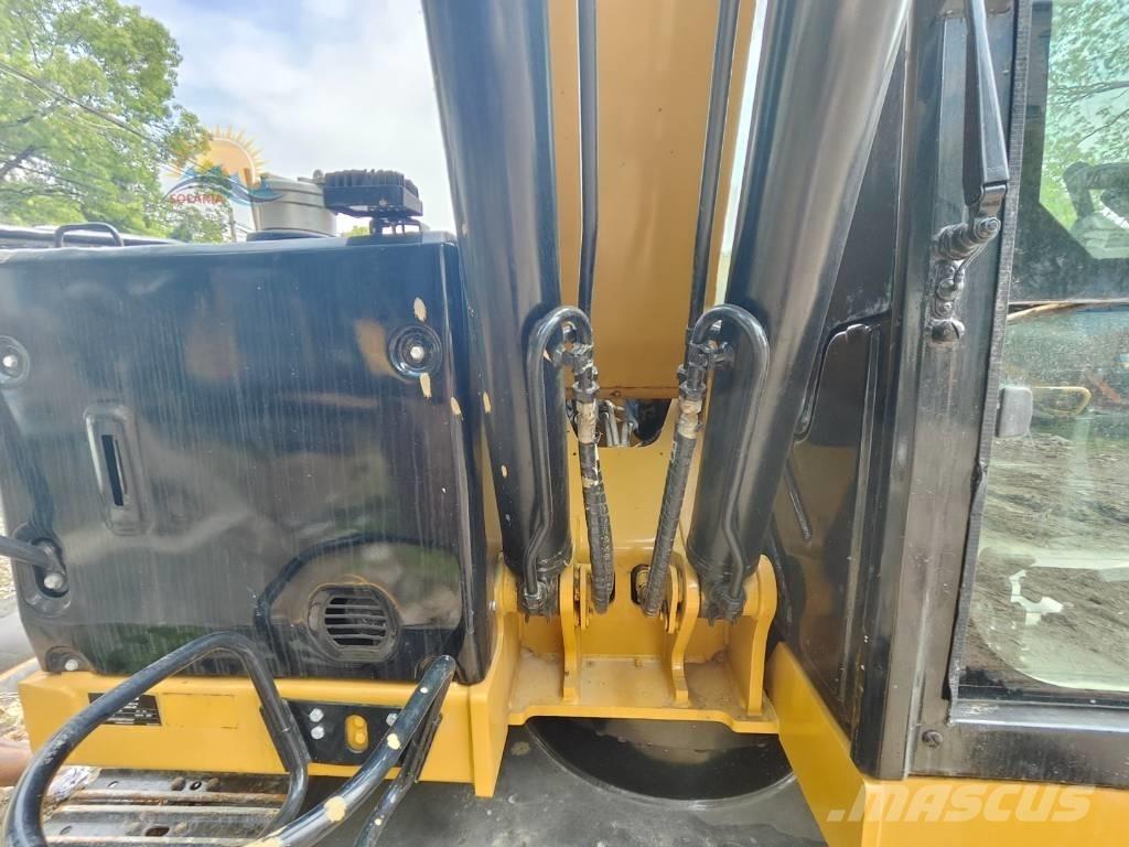 CAT 310 Bagri goseničarji