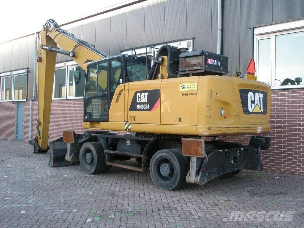 CAT MH3024 Bagri za prekladanje primarnih/sekundarnih surovin