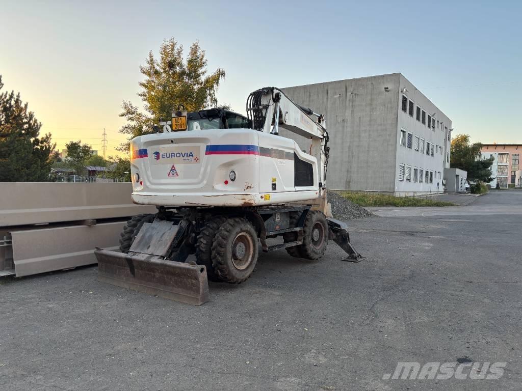 CAT m314f Bagri na kolesih