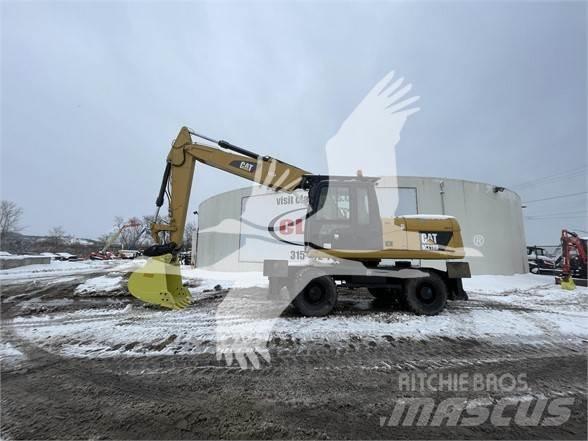 CAT M318D Bagri na kolesih