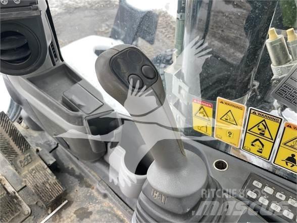 CAT M318D Bagri na kolesih