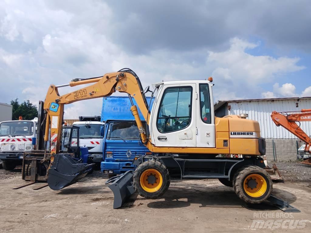 Liebherr A 311 Bagri na kolesih