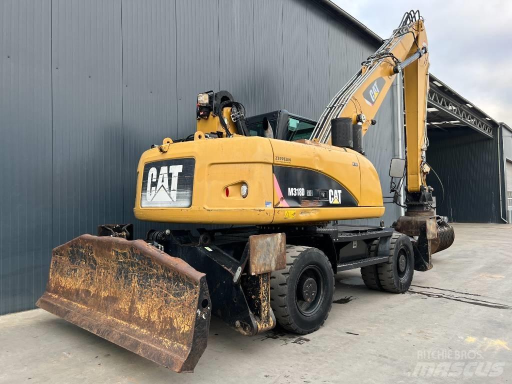 CAT M318D MH Bagri za prekladanje primarnih/sekundarnih surovin