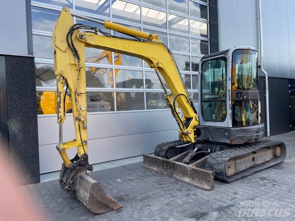 New Holland E50.2 Mini bagri <7t