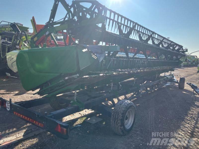 John Deere T 670 i Kombajni