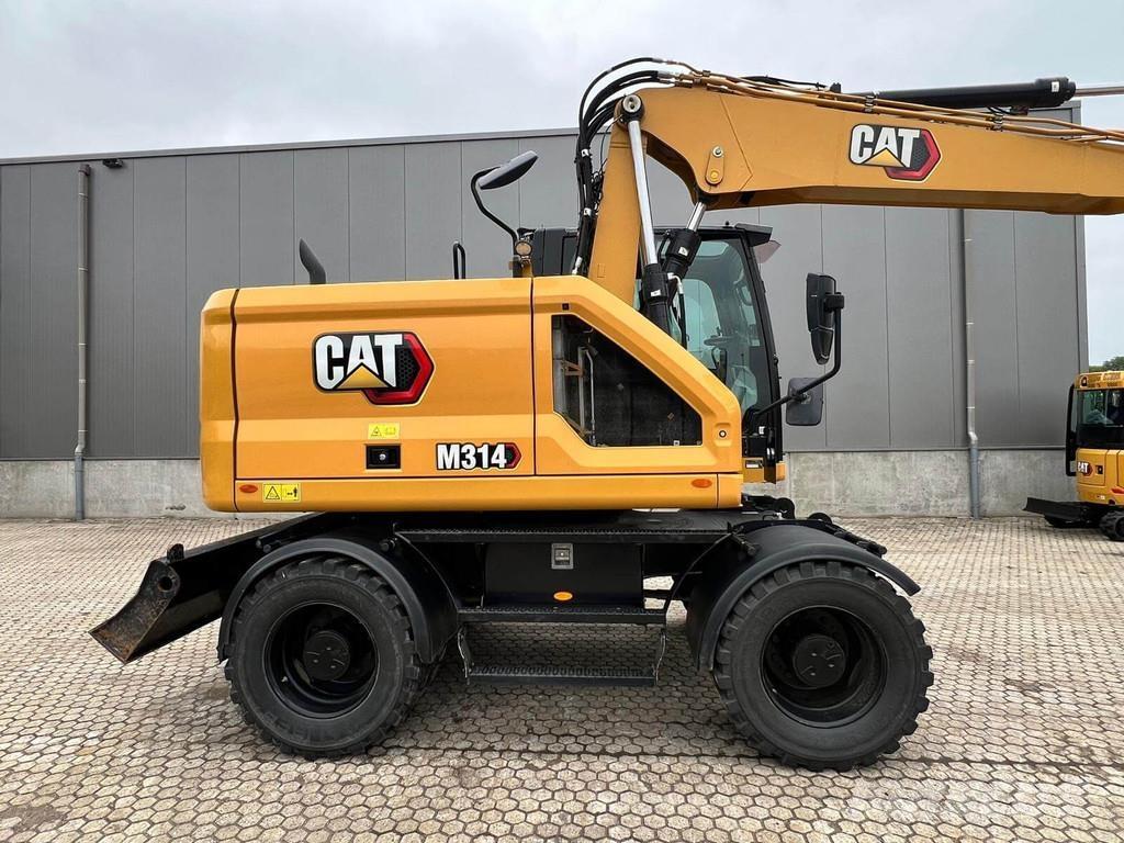 CAT M314-07 Bagri na kolesih