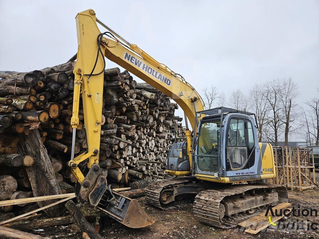 New Holland E 145 Bagri goseničarji