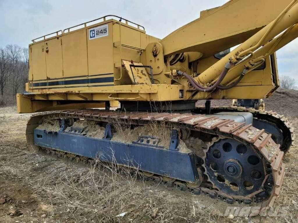 CAT 245 Bagri goseničarji