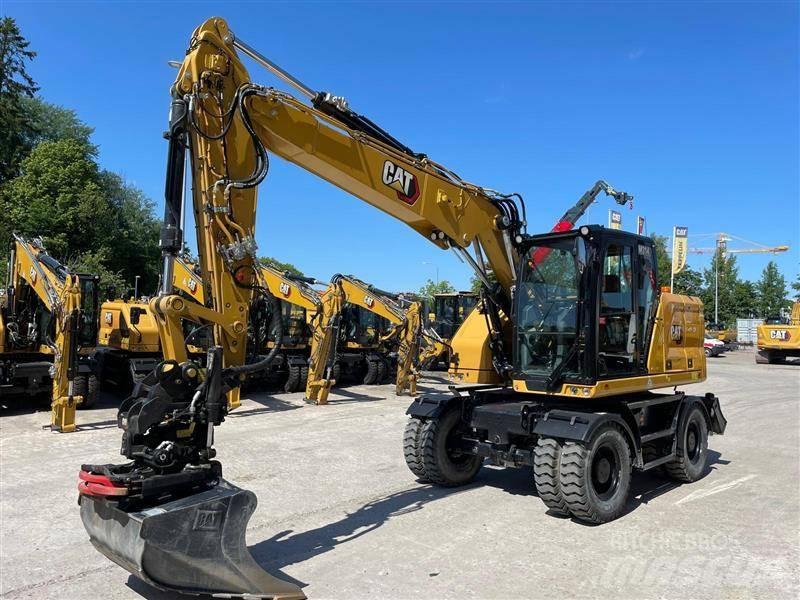 CAT M314 Bagri na kolesih