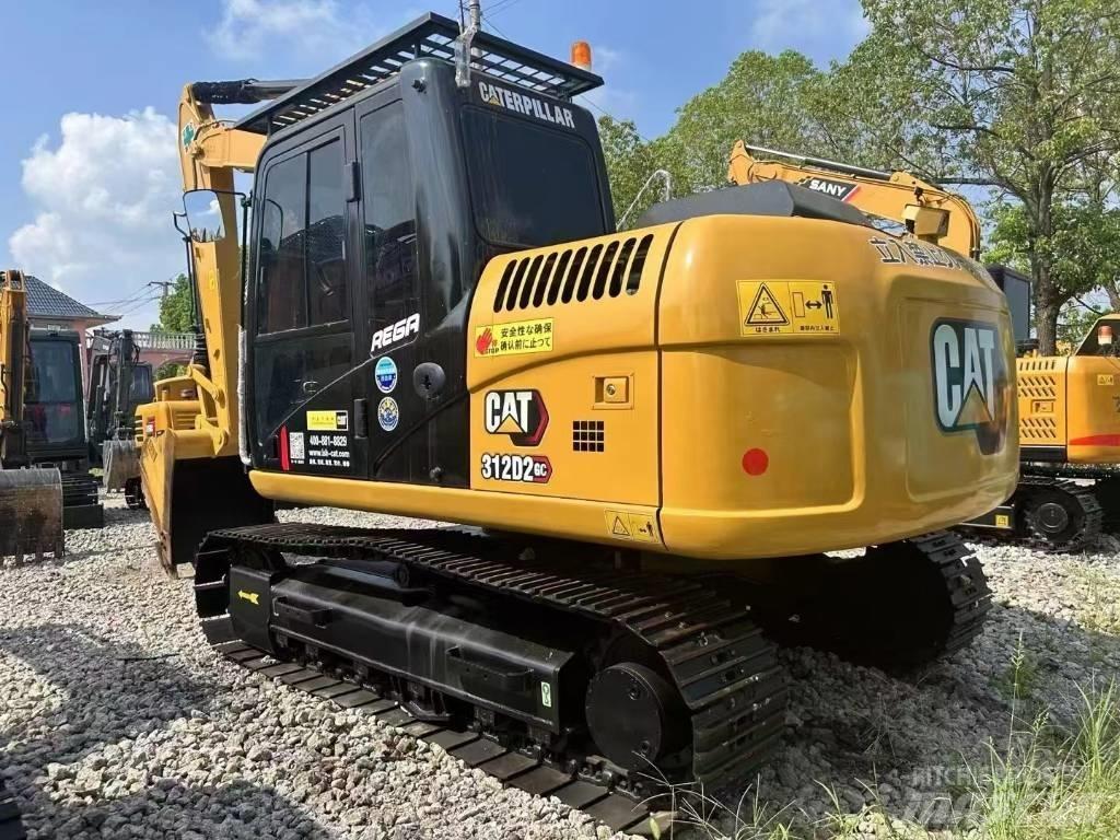 CAT 312 DGC Bagri goseničarji