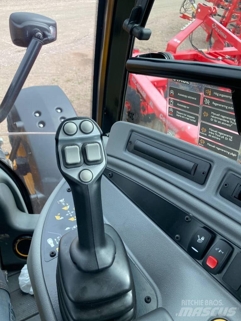 JCB 409 Kolesni nakladalci