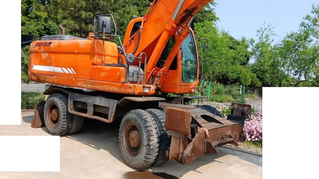 Doosan DX 210 W Bagri na kolesih
