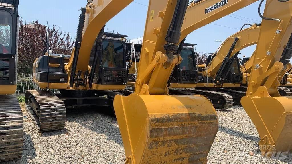 CAT 323 Bagri goseničarji