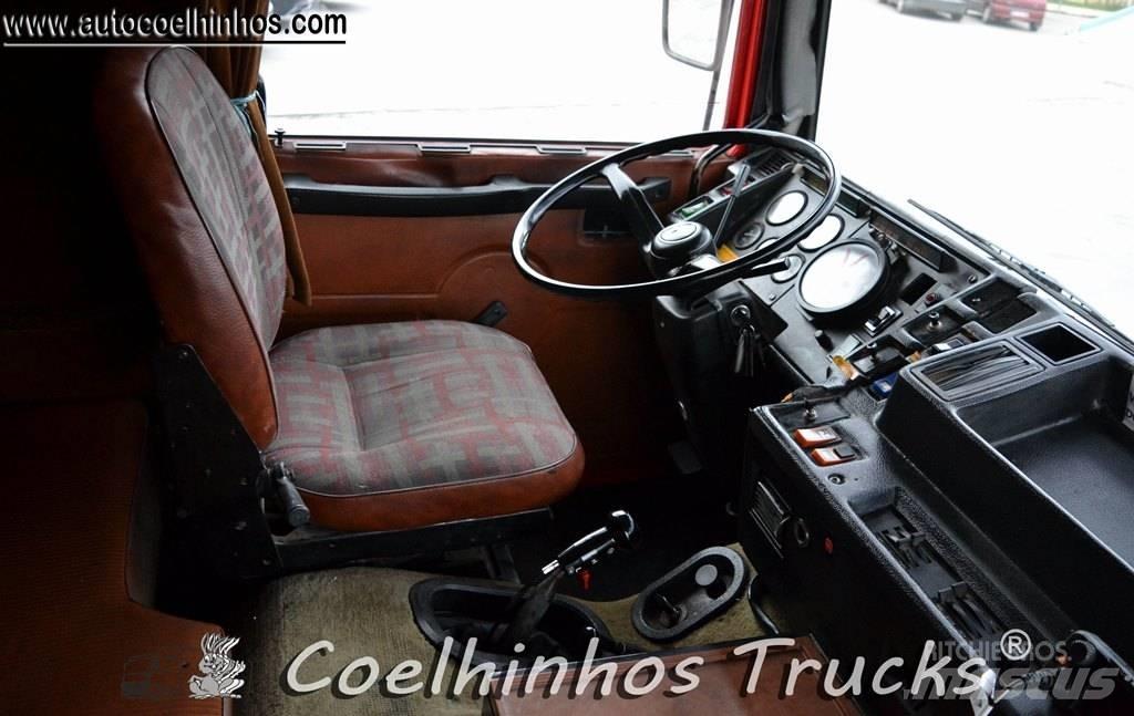 Volvo F10 Tovornjaki s kesonom/platojem