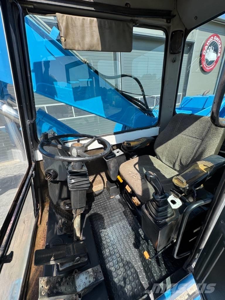 Fuchs MHL 331 Bagri za prekladanje primarnih/sekundarnih surovin