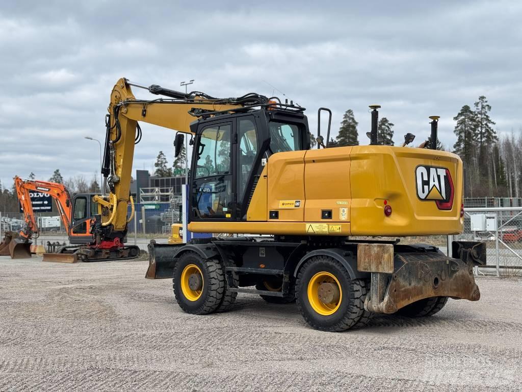 CAT M 318 Bagri na kolesih