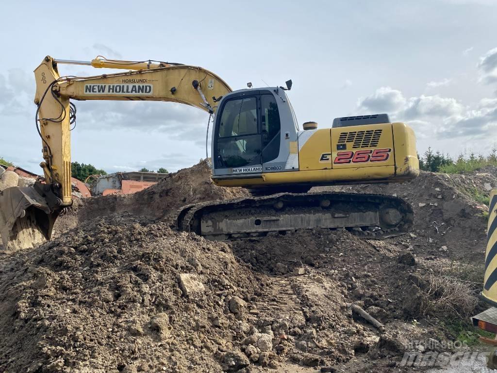 New Holland E 265 Bagri goseničarji