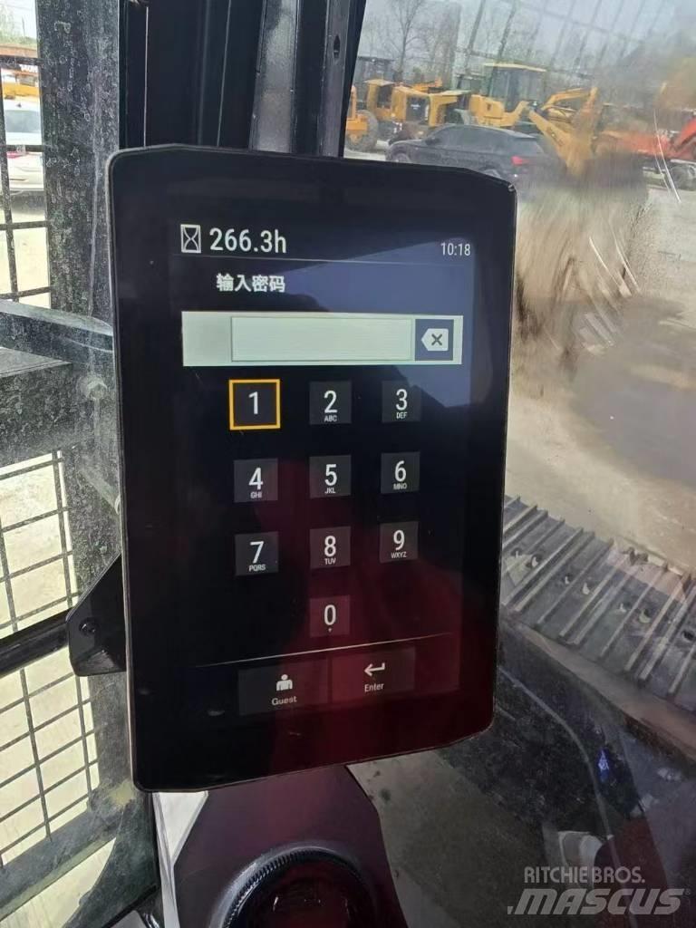 CAT 320 Bagri goseničarji