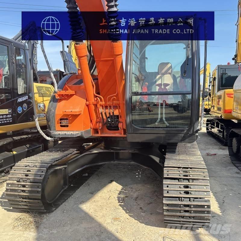 Hitachi ZX 135 US Bagri goseničarji