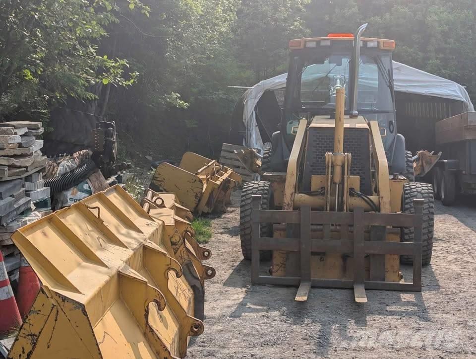 John Deere 310 SE Rovokopači