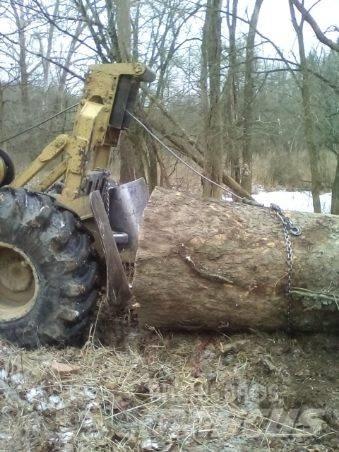 CAT 515 Skidder Skid steer mini nakladalci