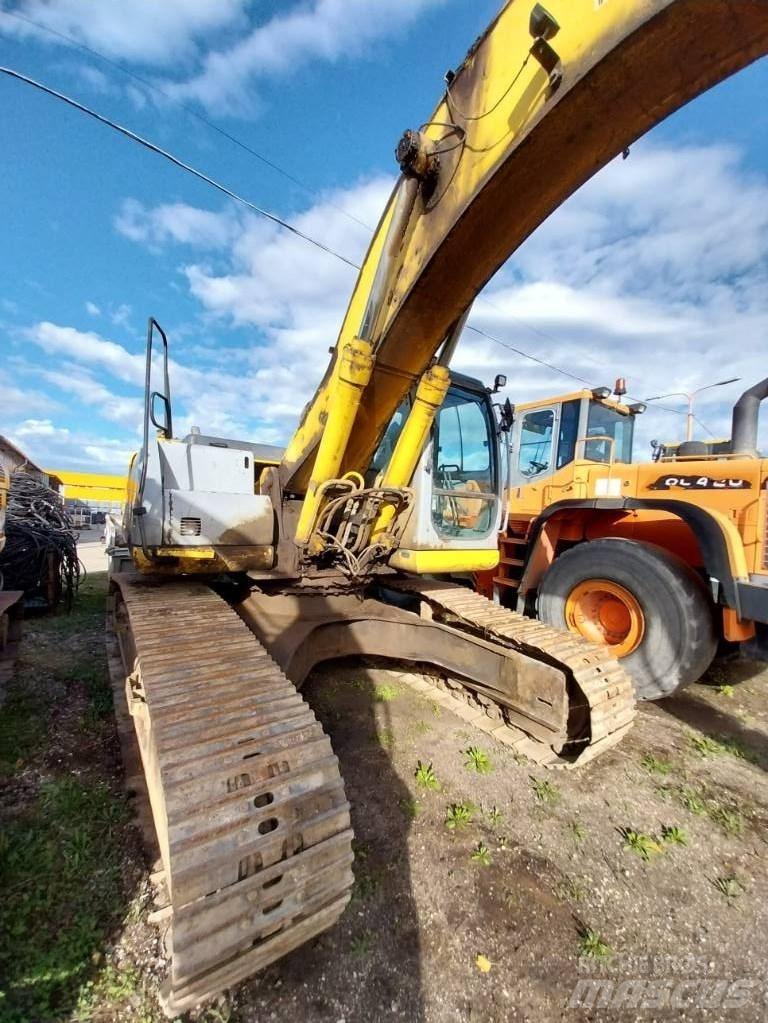 New Holland E 305 Bagri goseničarji