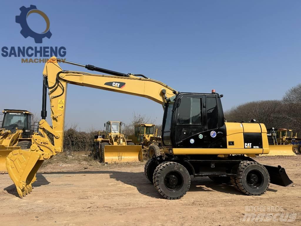 CAT M 320 D2 Bagri na kolesih