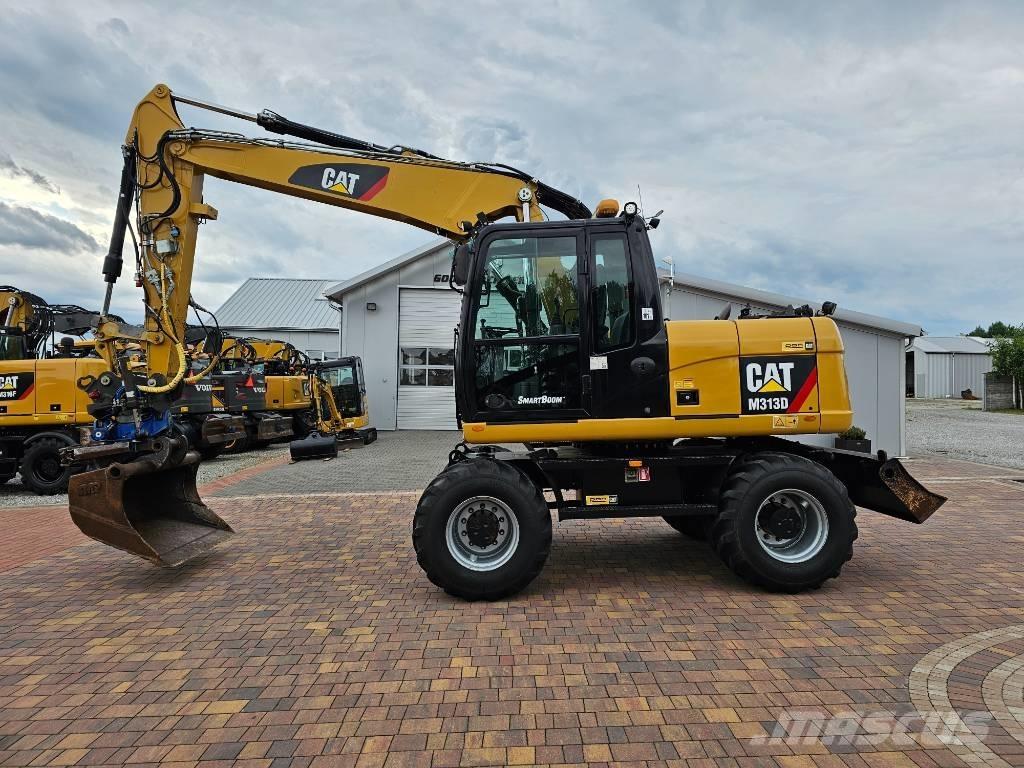 CAT M 313 D Bagri na kolesih