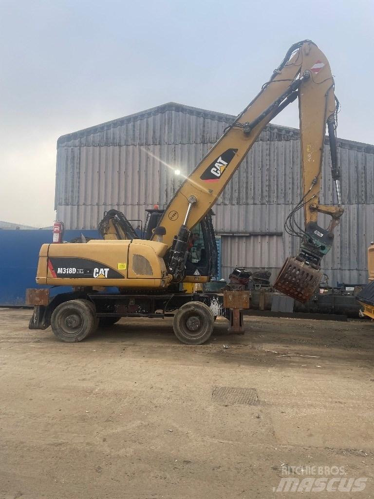 CAT 318 dmh Drugo