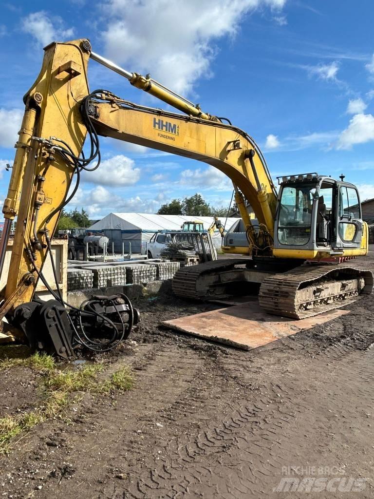 New Holland E 265 Bagri goseničarji