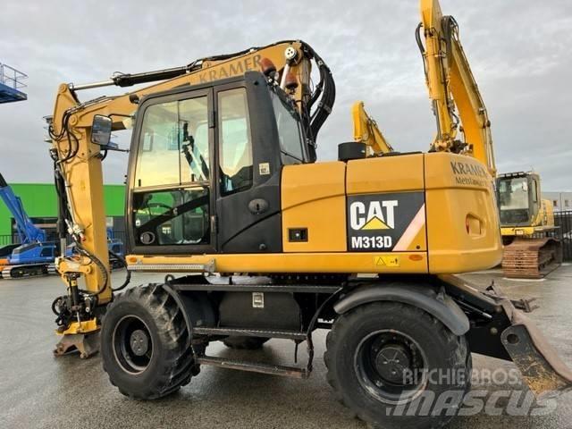 CAT M 313 D Bagri na kolesih