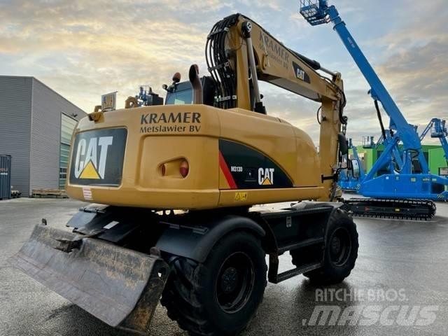 CAT M 313 D Bagri na kolesih