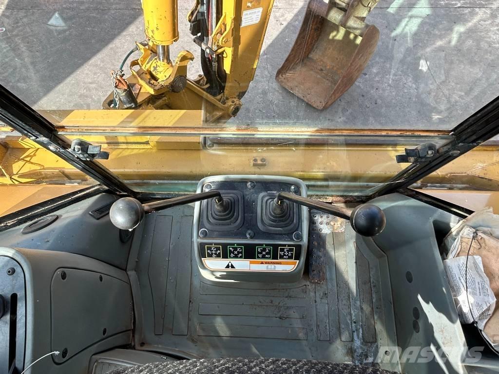 CAT 428 D Rovokopači