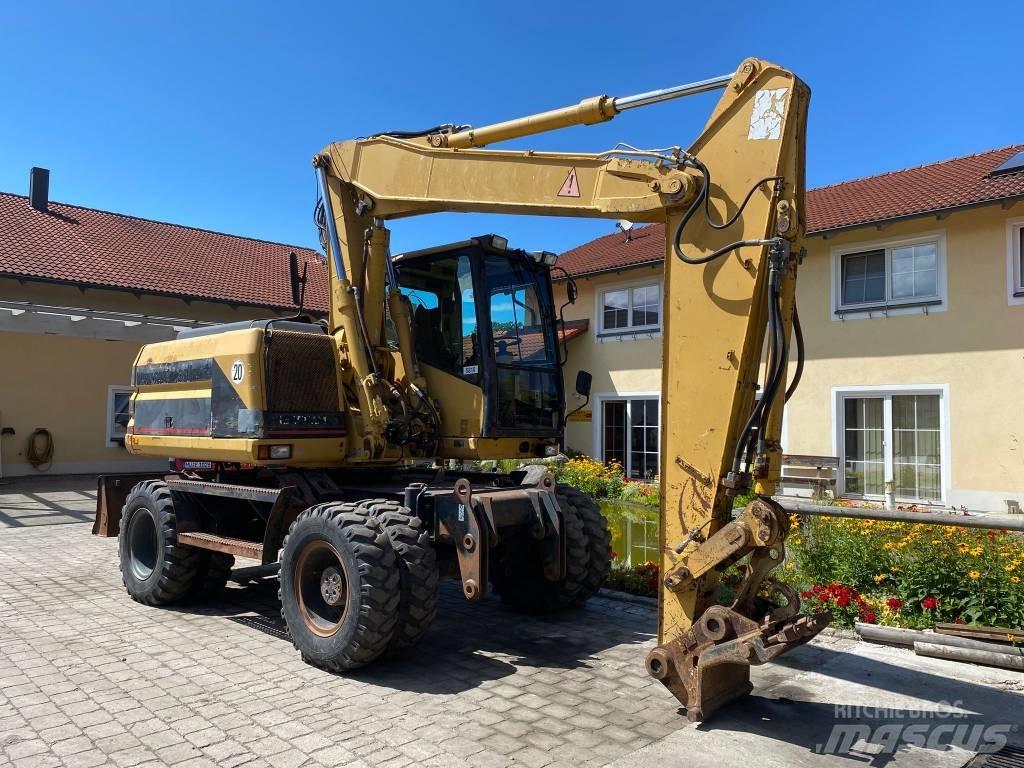 CAT M 312 Bagri na kolesih