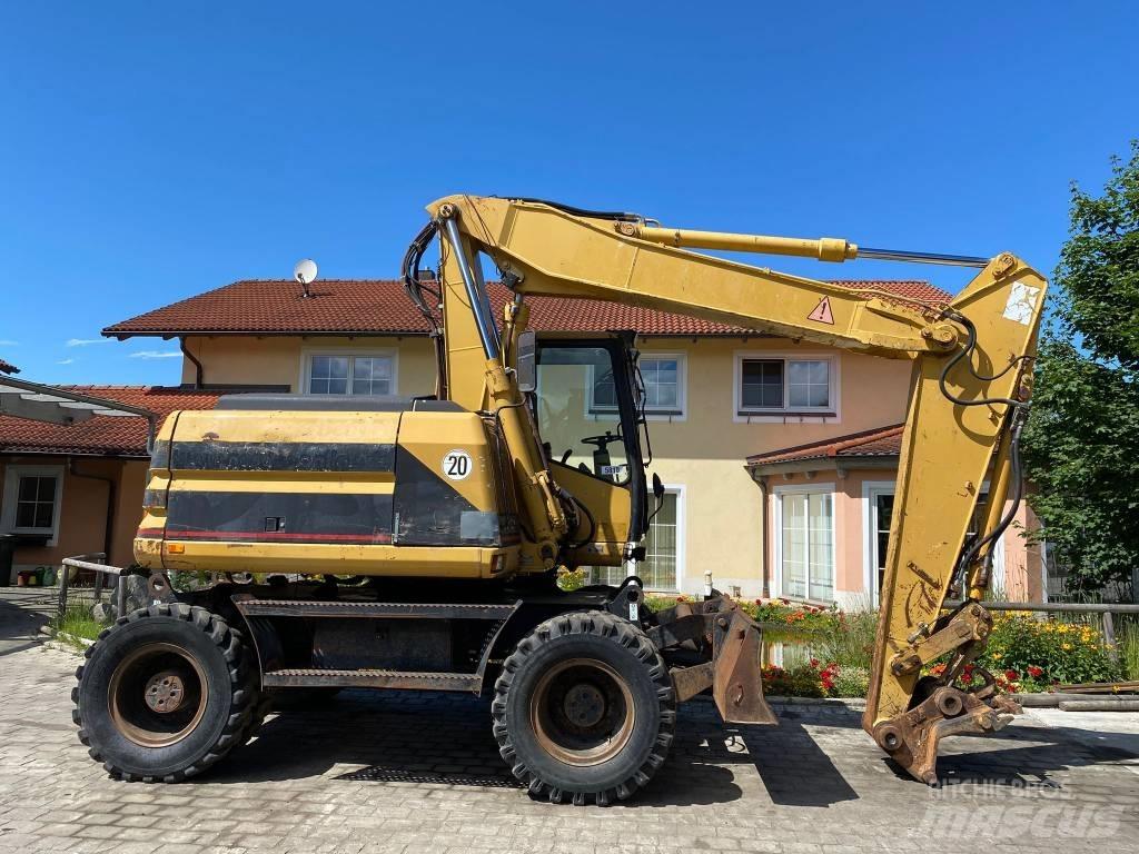 CAT M 312 Bagri na kolesih