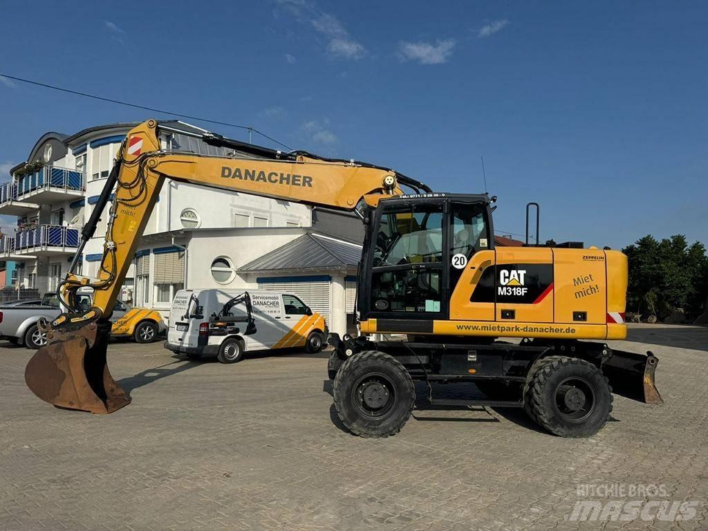 CAT M 318 F Bagri na kolesih