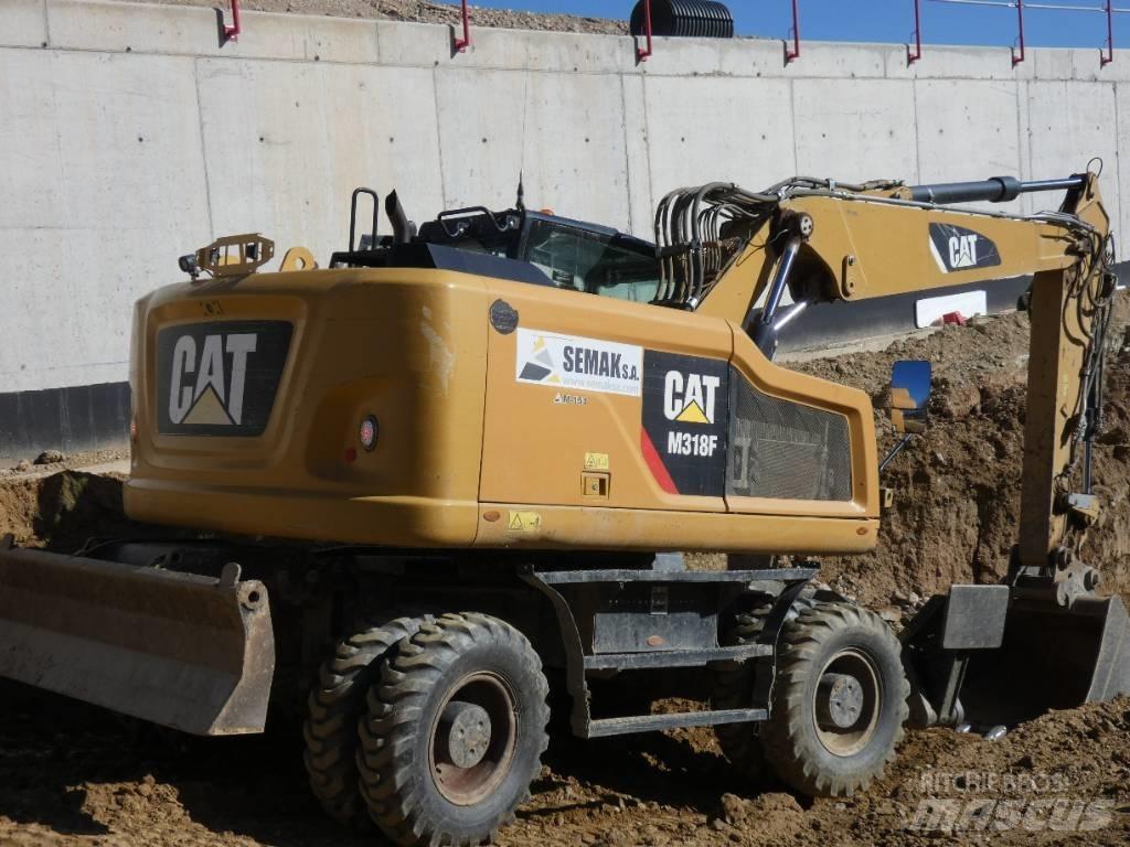 CAT M 318 F Bagri na kolesih