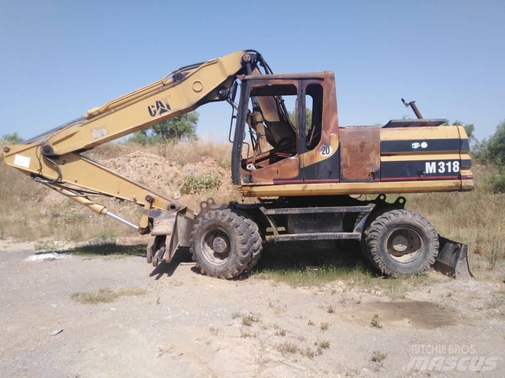 CAT M318 parts M 318 Bagri na kolesih