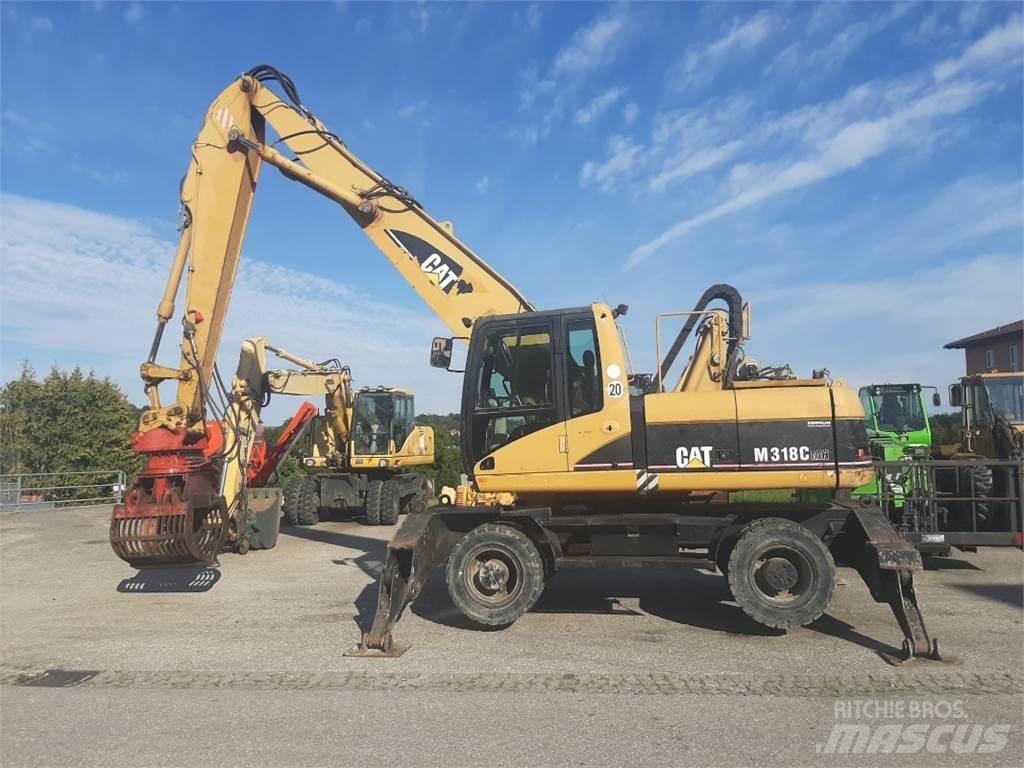 CAT M318C MH Bagri na kolesih