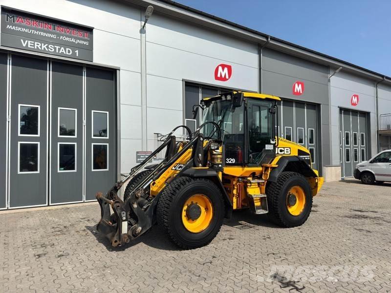 JCB 413 2.800h Kolesni nakladalci