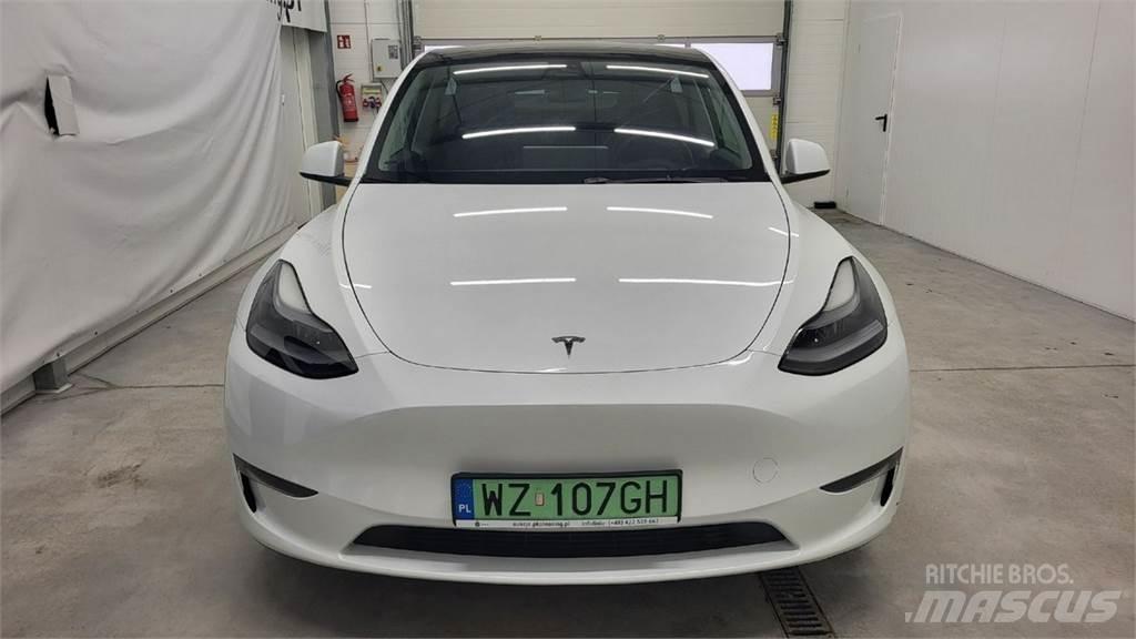 Tesla Y Avtomobili