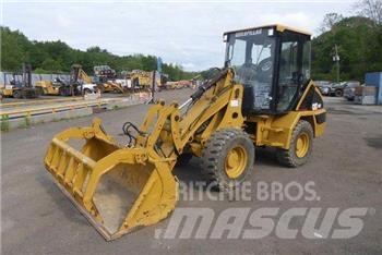 CAT 902 Kolesni nakladalci